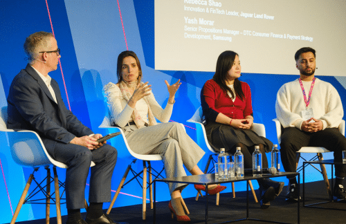 Speakers on stage at banking event