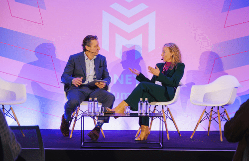 Speakers on stage at banking event